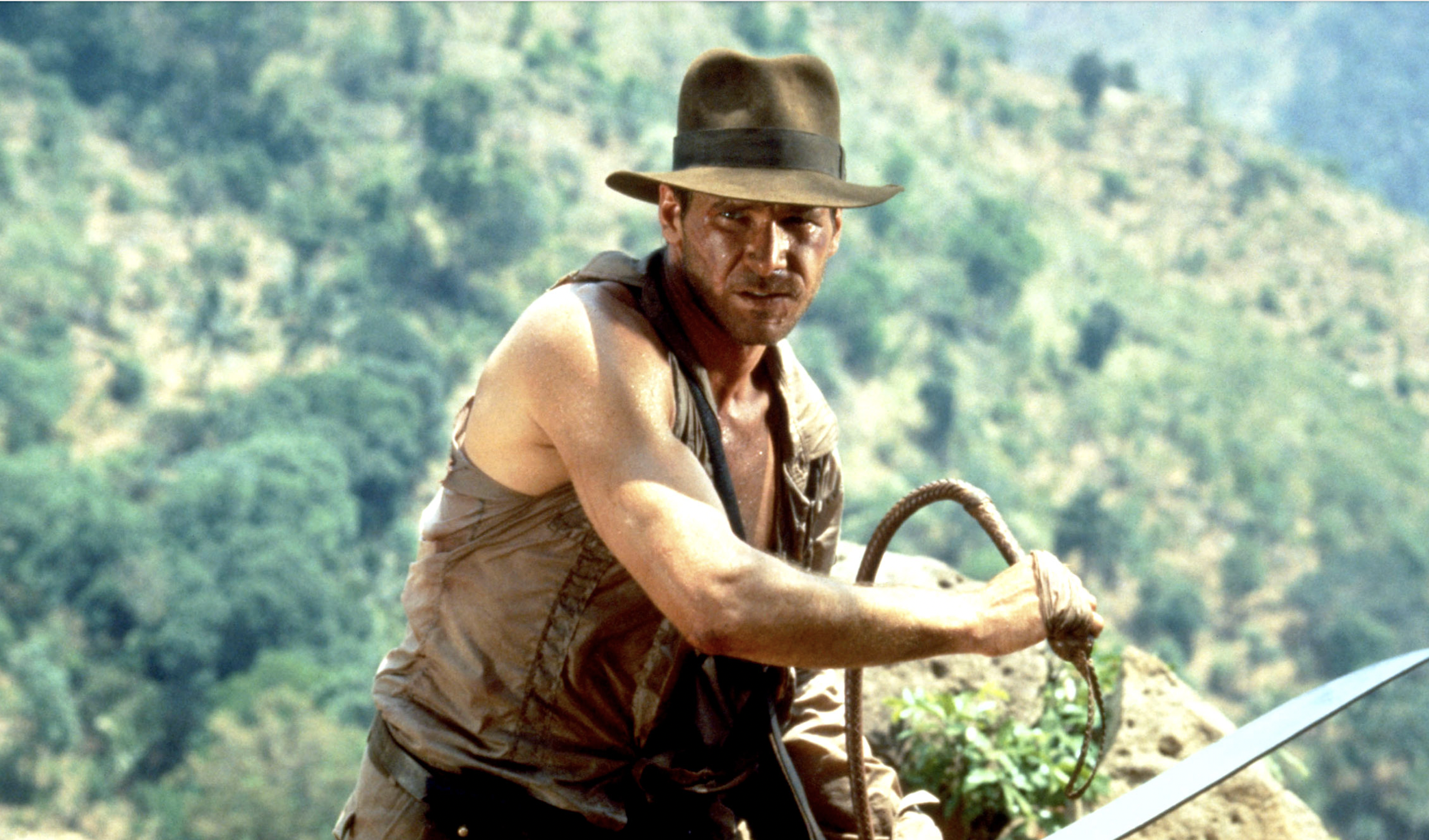 Harrison Ford as Indiana Jones with whip and hat