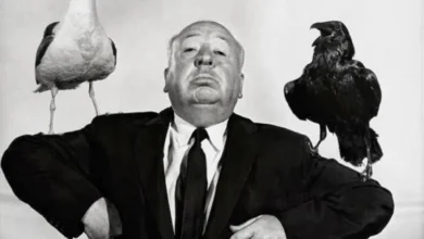 Alfred Hitchcock directing a suspense scene on set.